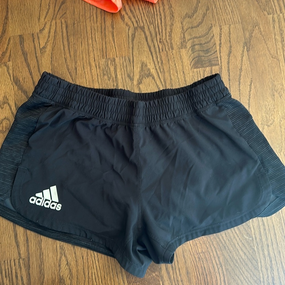 Adidas black shirt with running liner.
